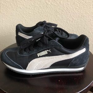 Puma classic black and white sneakers.